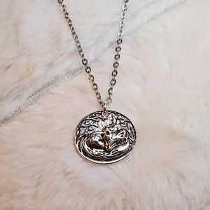 Sleeping fox charm necklace.